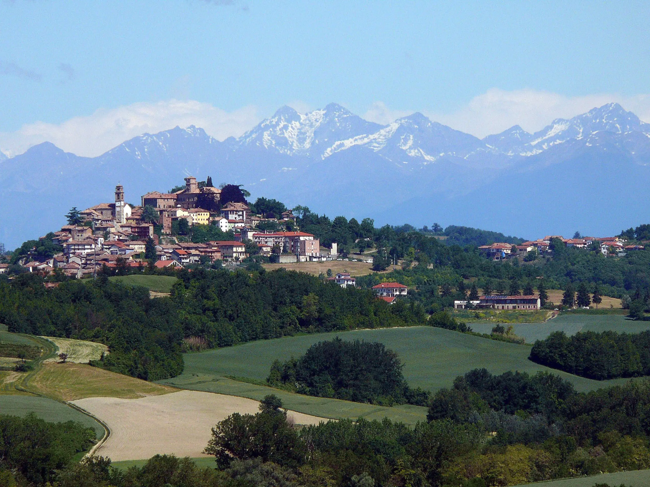 Montiglio Monferrato and the Monferrato hills with the Alps behind